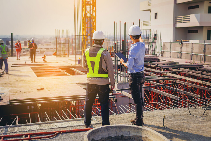 Construction workers consulting